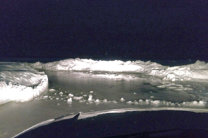 image of flooded road on the ice