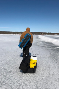 image of austin jones walking on ice