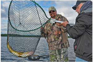 image of Randy Howton catching walleye