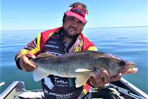 image of andy walsh with big walleye