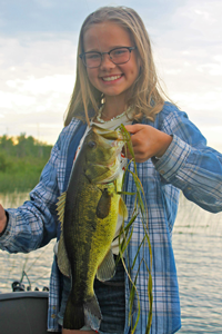 image of claire clusiau with big bass