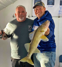 image of rick rone and joe henry with big walleye