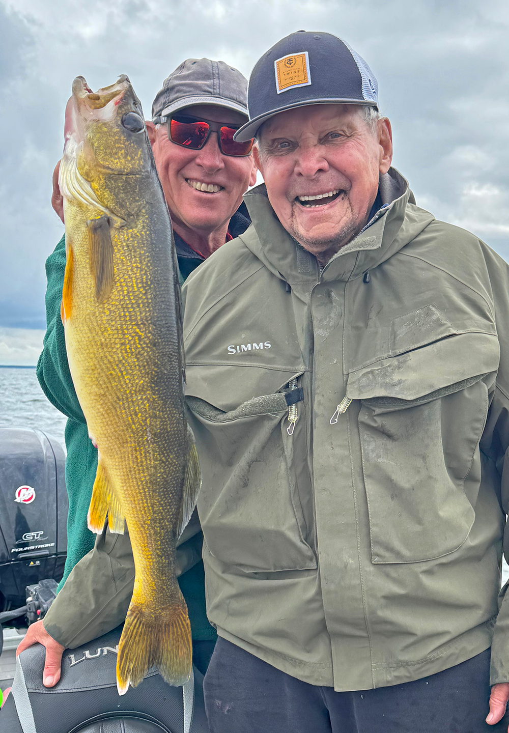 image of Carl Bergquist with big Walleye from Lake Winnibigoshish