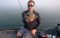 Link to fishing video that shows how to catch smallmouth bass on topwater baits in calm water