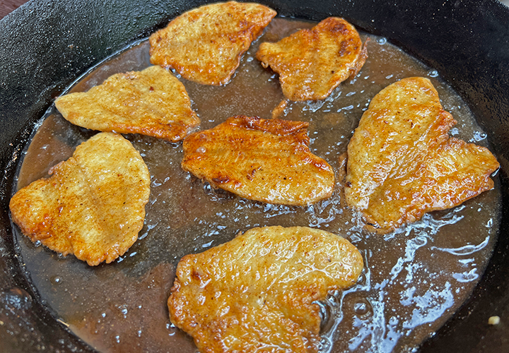 image of panfish cooking in Jeff Sundin's frying pan