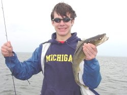 image of angler with walleye