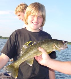 fishing kid with nice walleye